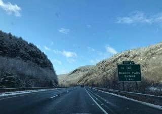 Highway scene with Beacon Falls Exit Sign information 